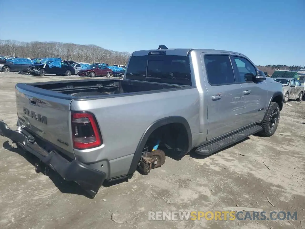 3 Photograph of a damaged car 1C6SRFLT0MN579062 RAM 1500 2021