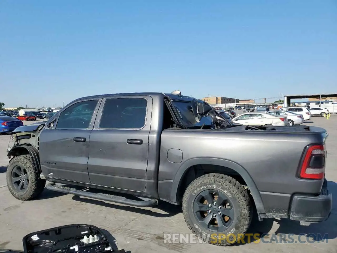 2 Photograph of a damaged car 1C6SRFLT0MN585881 RAM 1500 2021