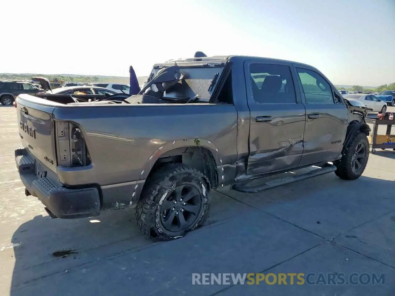 3 Photograph of a damaged car 1C6SRFLT0MN585881 RAM 1500 2021