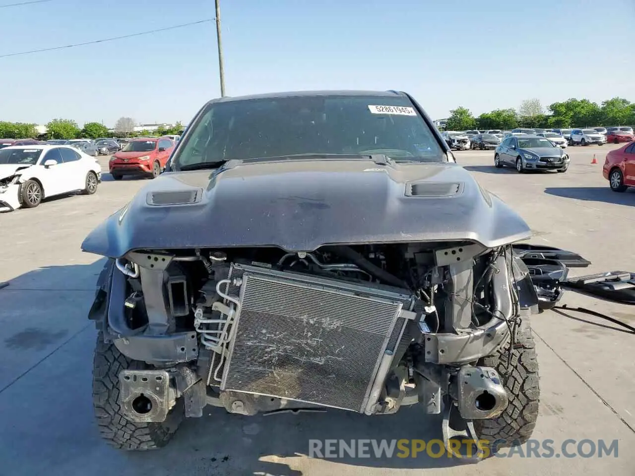 5 Photograph of a damaged car 1C6SRFLT0MN585881 RAM 1500 2021