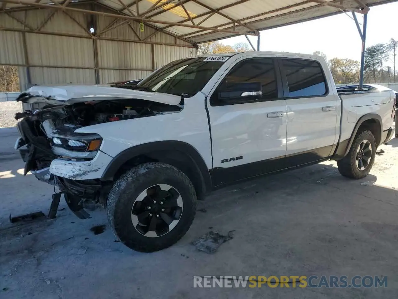 1 Photograph of a damaged car 1C6SRFLT2MN529005 RAM 1500 2021