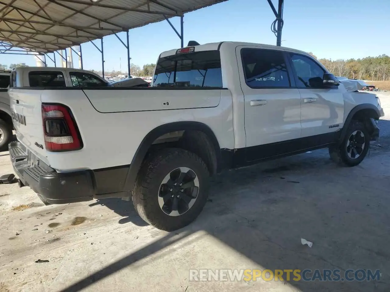3 Photograph of a damaged car 1C6SRFLT2MN529005 RAM 1500 2021
