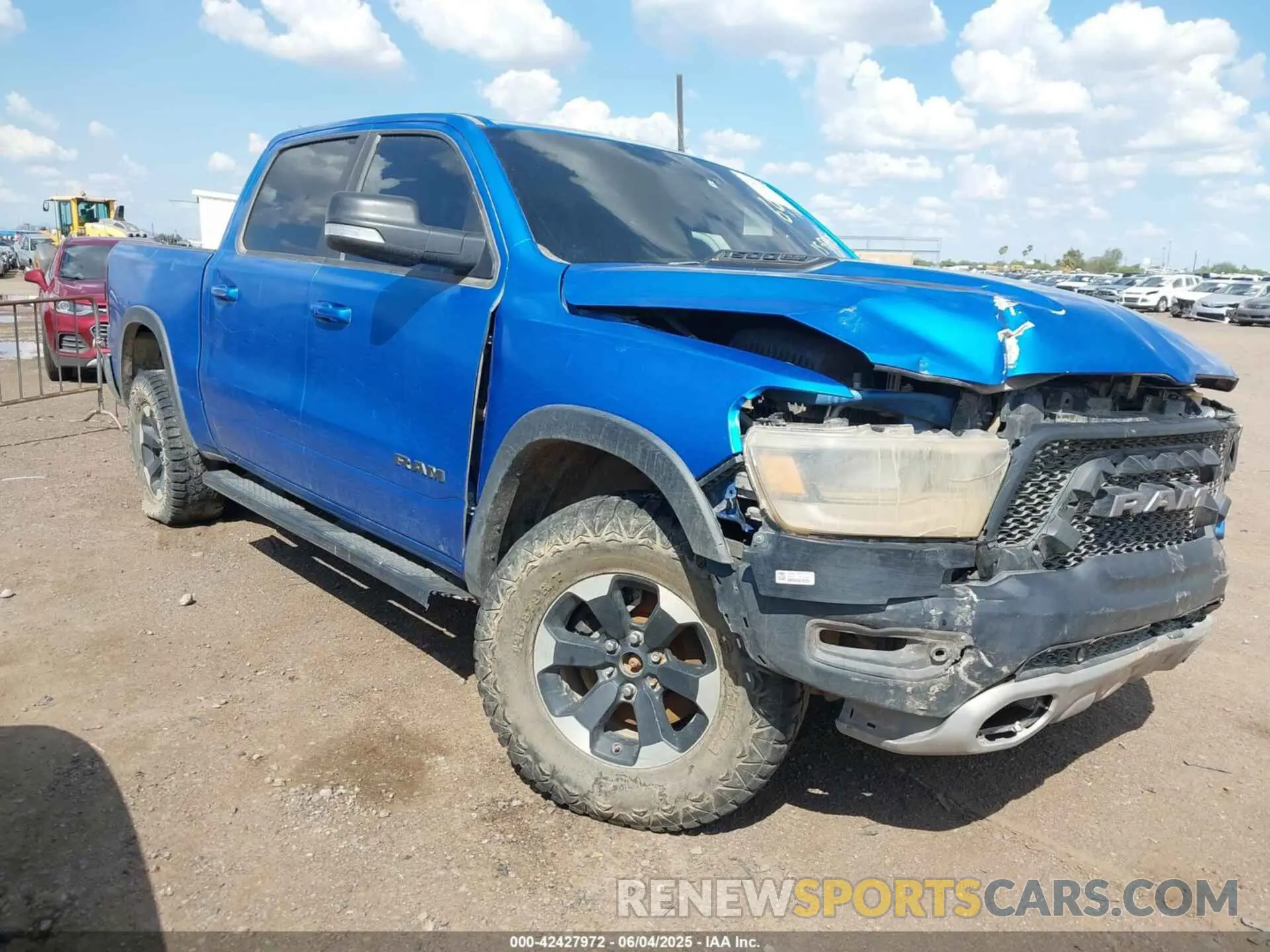 1 Photograph of a damaged car 1C6SRFLT3MN573143 RAM 1500 2021