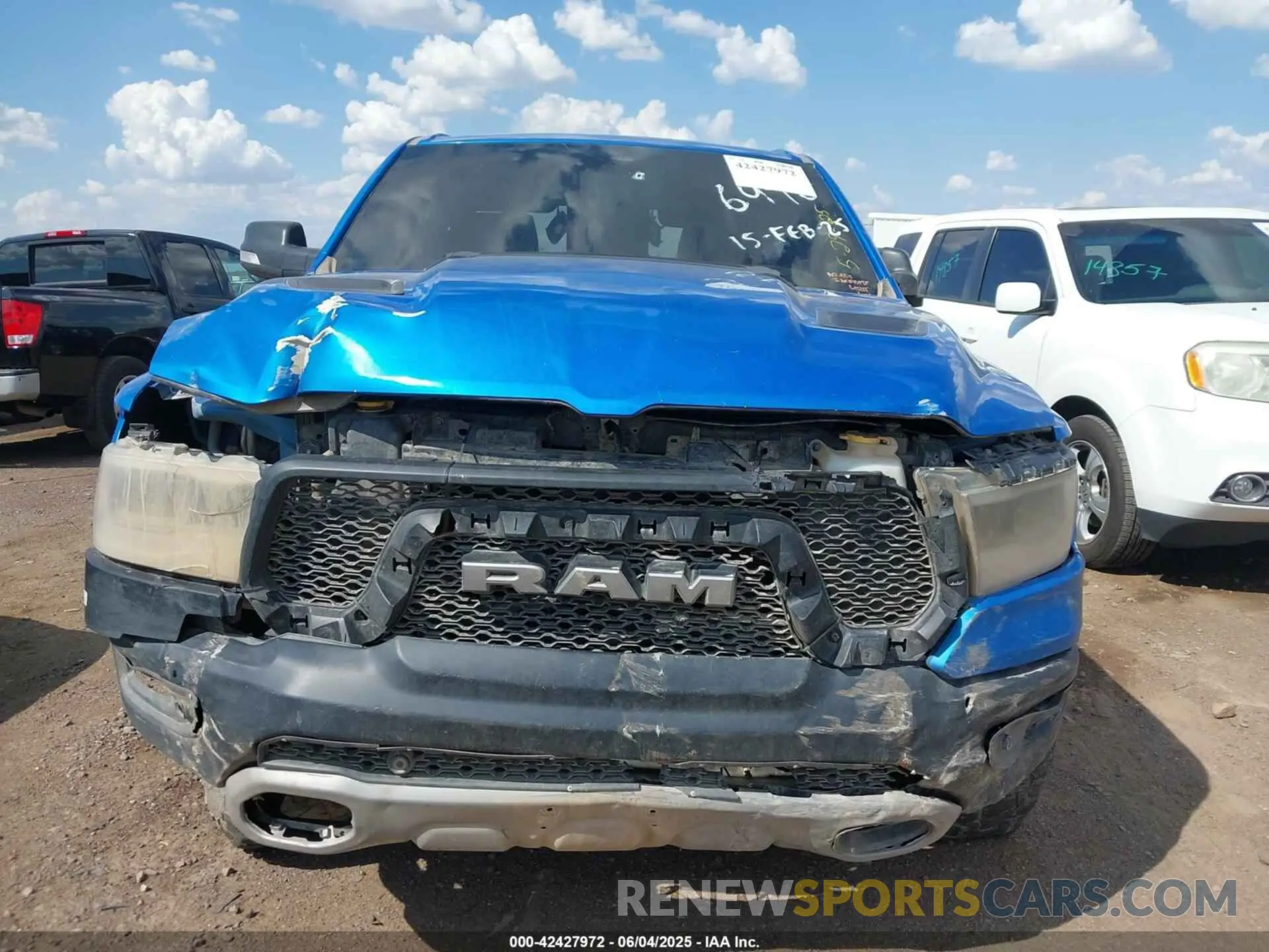 11 Photograph of a damaged car 1C6SRFLT3MN573143 RAM 1500 2021