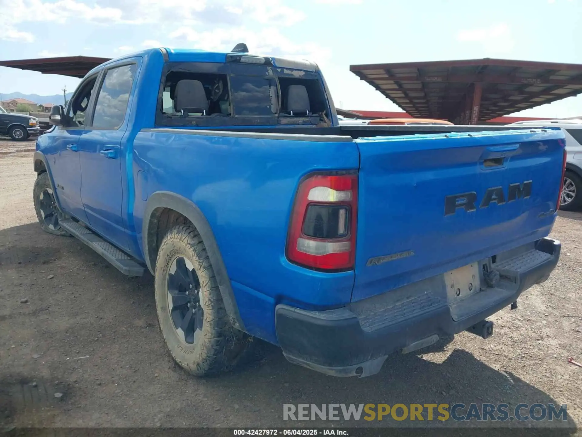 3 Photograph of a damaged car 1C6SRFLT3MN573143 RAM 1500 2021