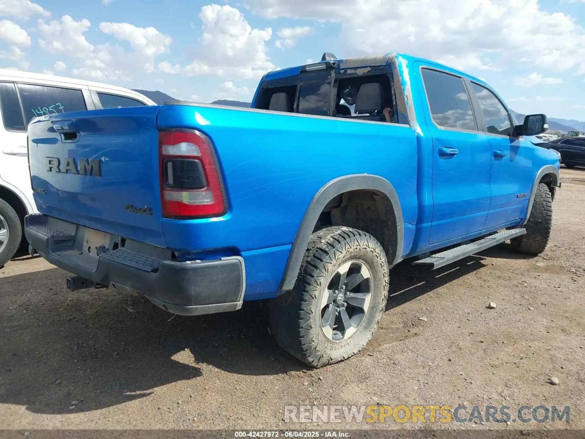 4 Photograph of a damaged car 1C6SRFLT3MN573143 RAM 1500 2021