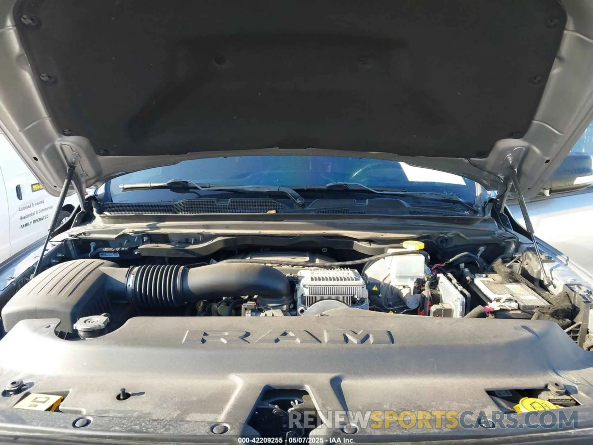 10 Photograph of a damaged car 1C6SRFLT3MN778445 RAM 1500 2021