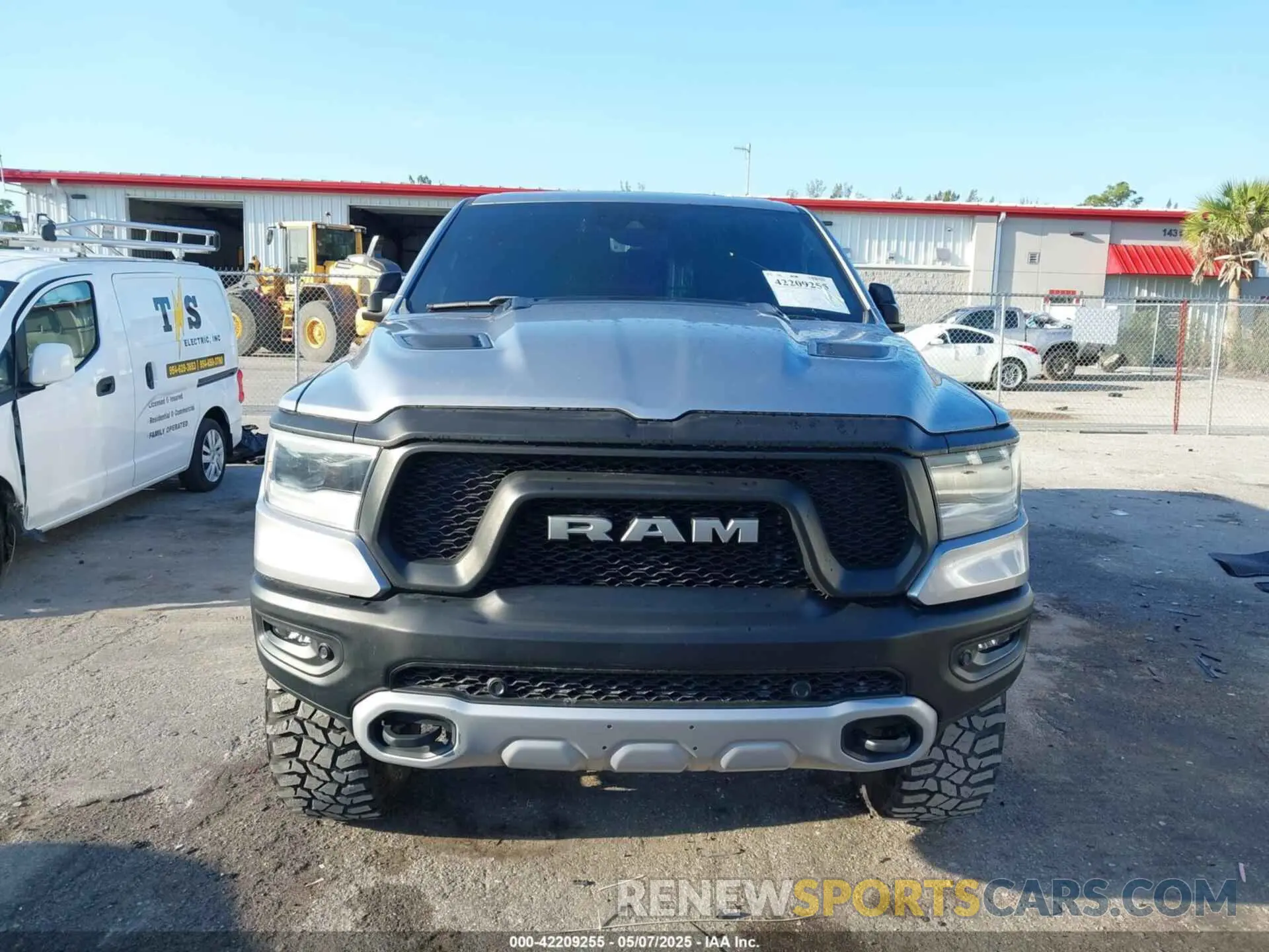 11 Photograph of a damaged car 1C6SRFLT3MN778445 RAM 1500 2021