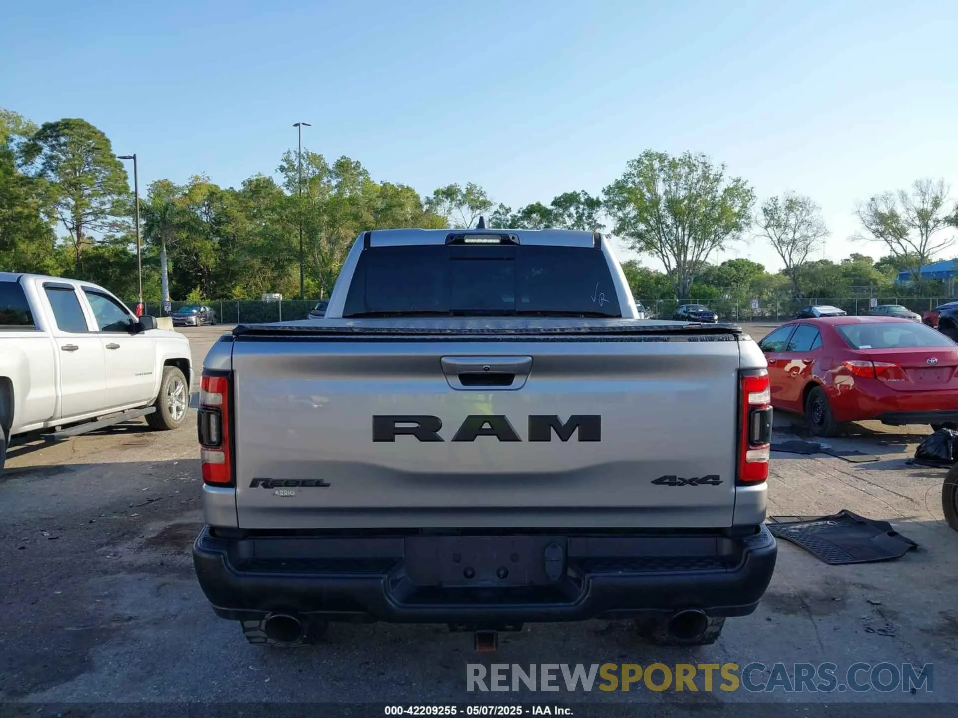 15 Photograph of a damaged car 1C6SRFLT3MN778445 RAM 1500 2021
