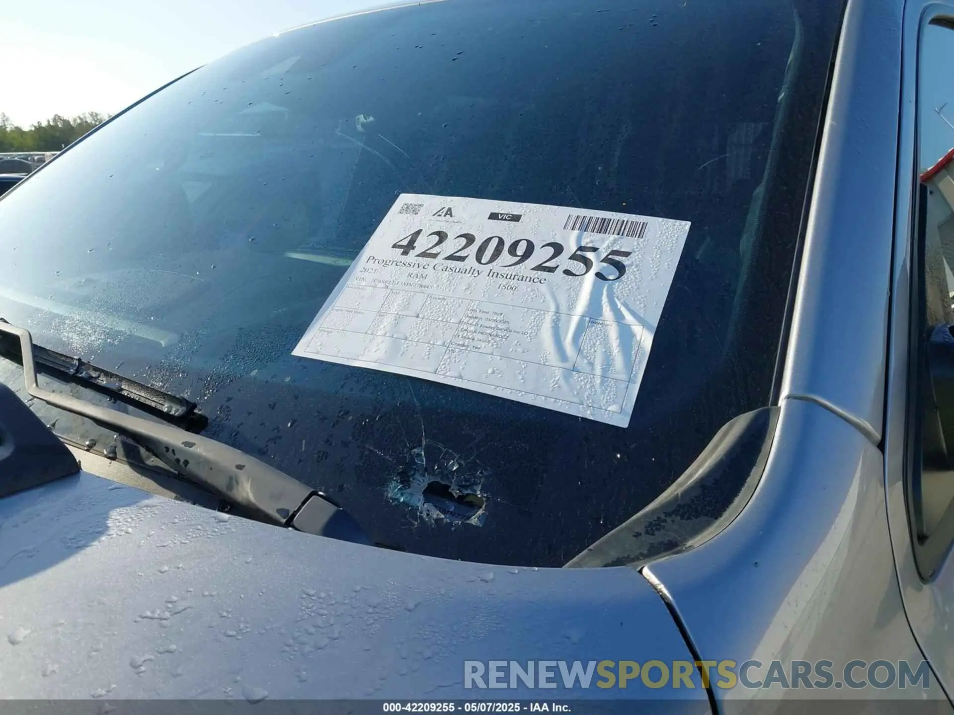 16 Photograph of a damaged car 1C6SRFLT3MN778445 RAM 1500 2021