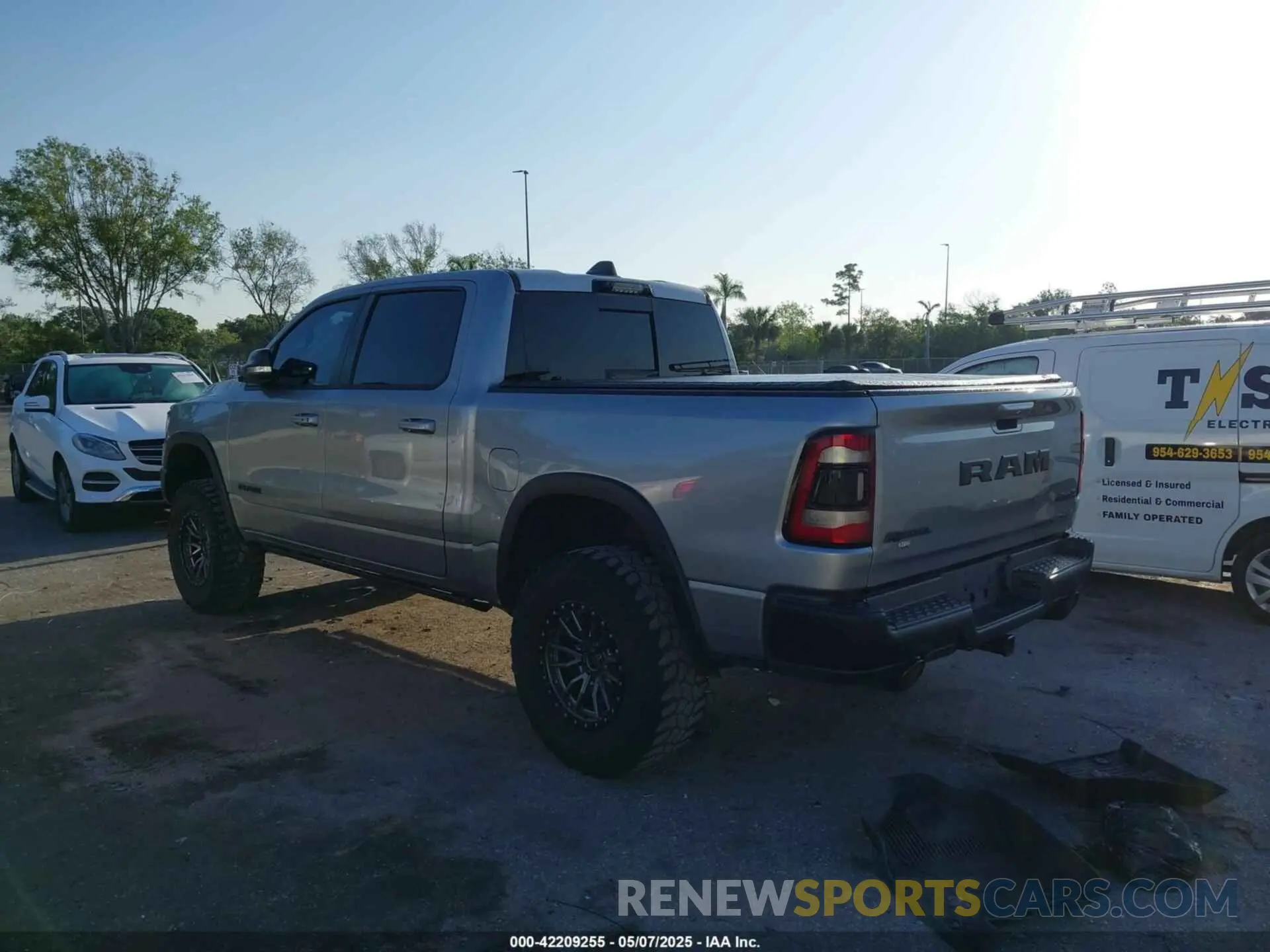 3 Photograph of a damaged car 1C6SRFLT3MN778445 RAM 1500 2021