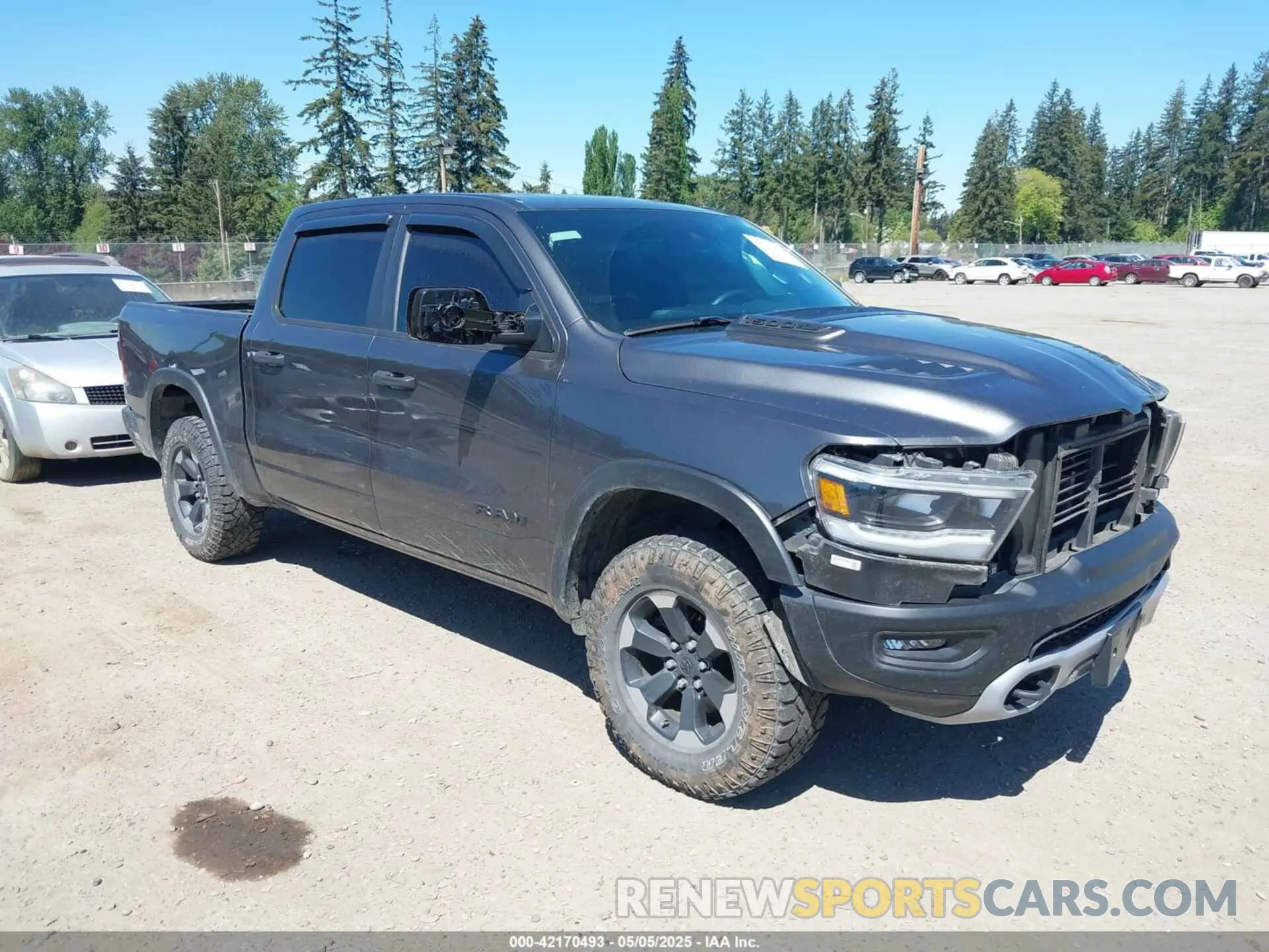 1 Photograph of a damaged car 1C6SRFLT4MN508768 RAM 1500 2021