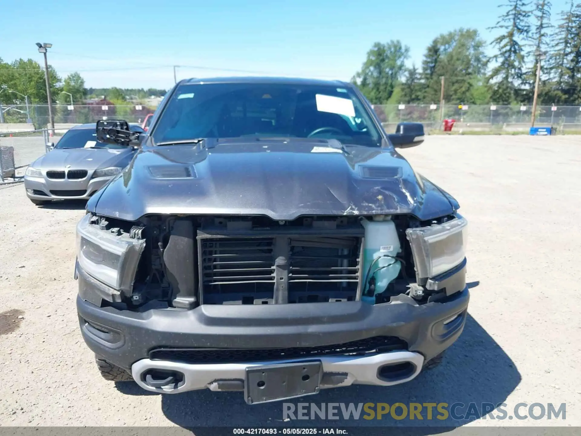 12 Photograph of a damaged car 1C6SRFLT4MN508768 RAM 1500 2021