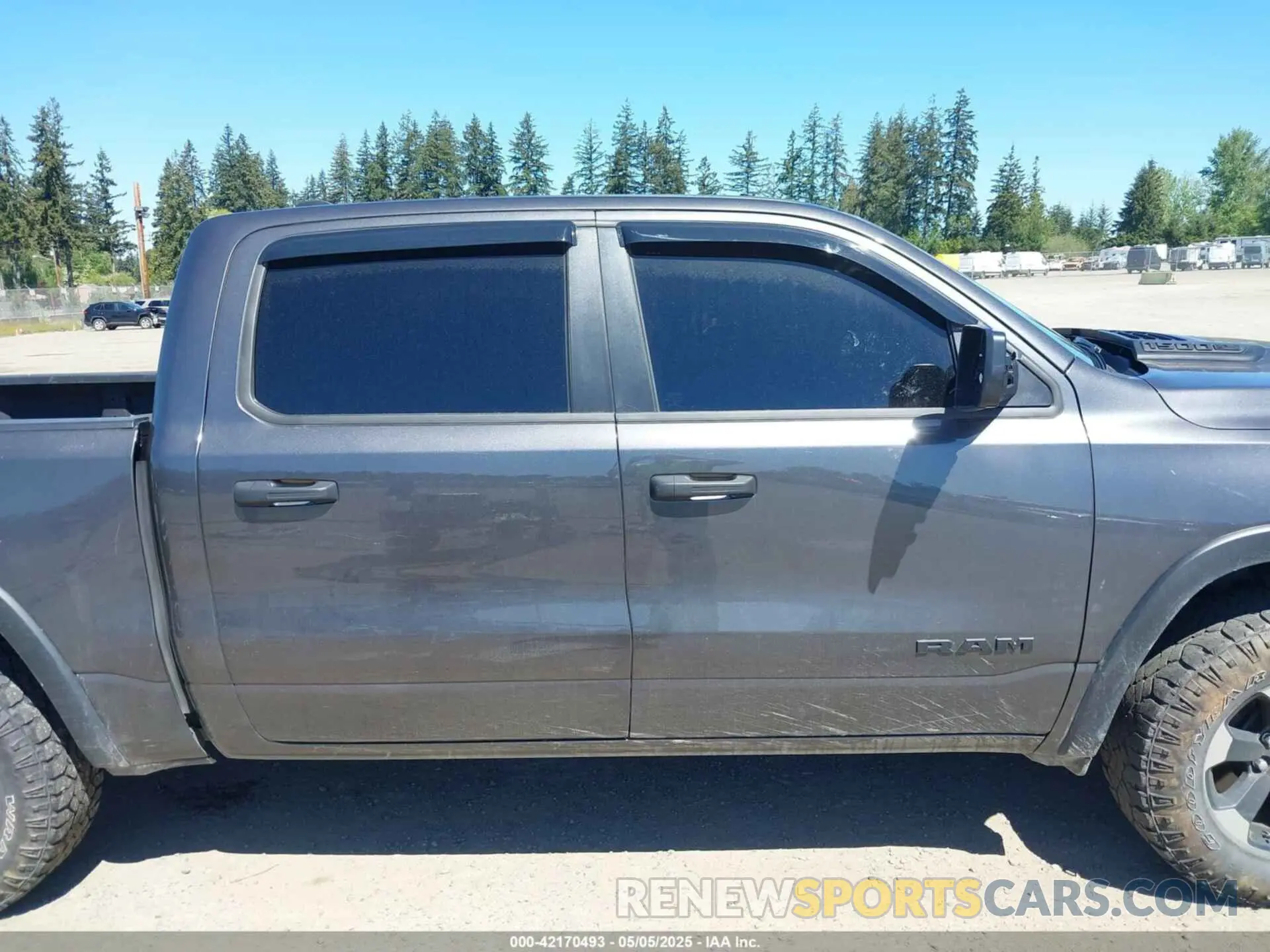 13 Photograph of a damaged car 1C6SRFLT4MN508768 RAM 1500 2021