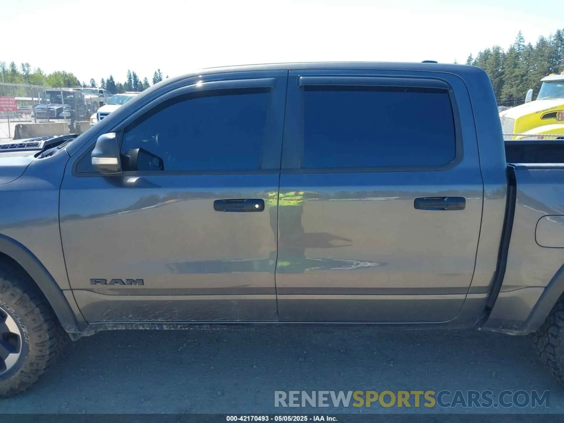 14 Photograph of a damaged car 1C6SRFLT4MN508768 RAM 1500 2021