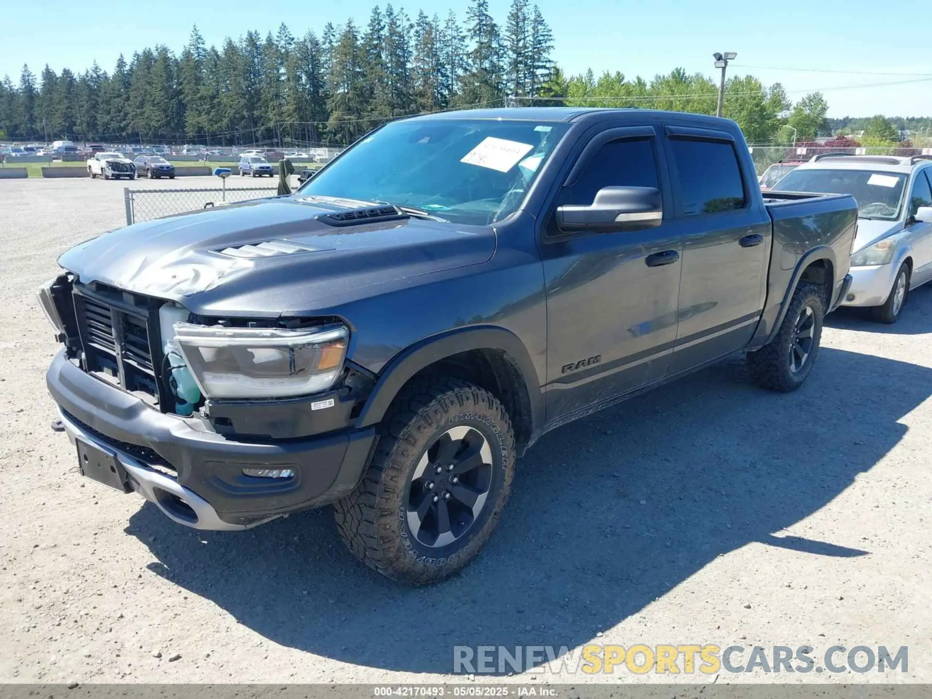 2 Photograph of a damaged car 1C6SRFLT4MN508768 RAM 1500 2021