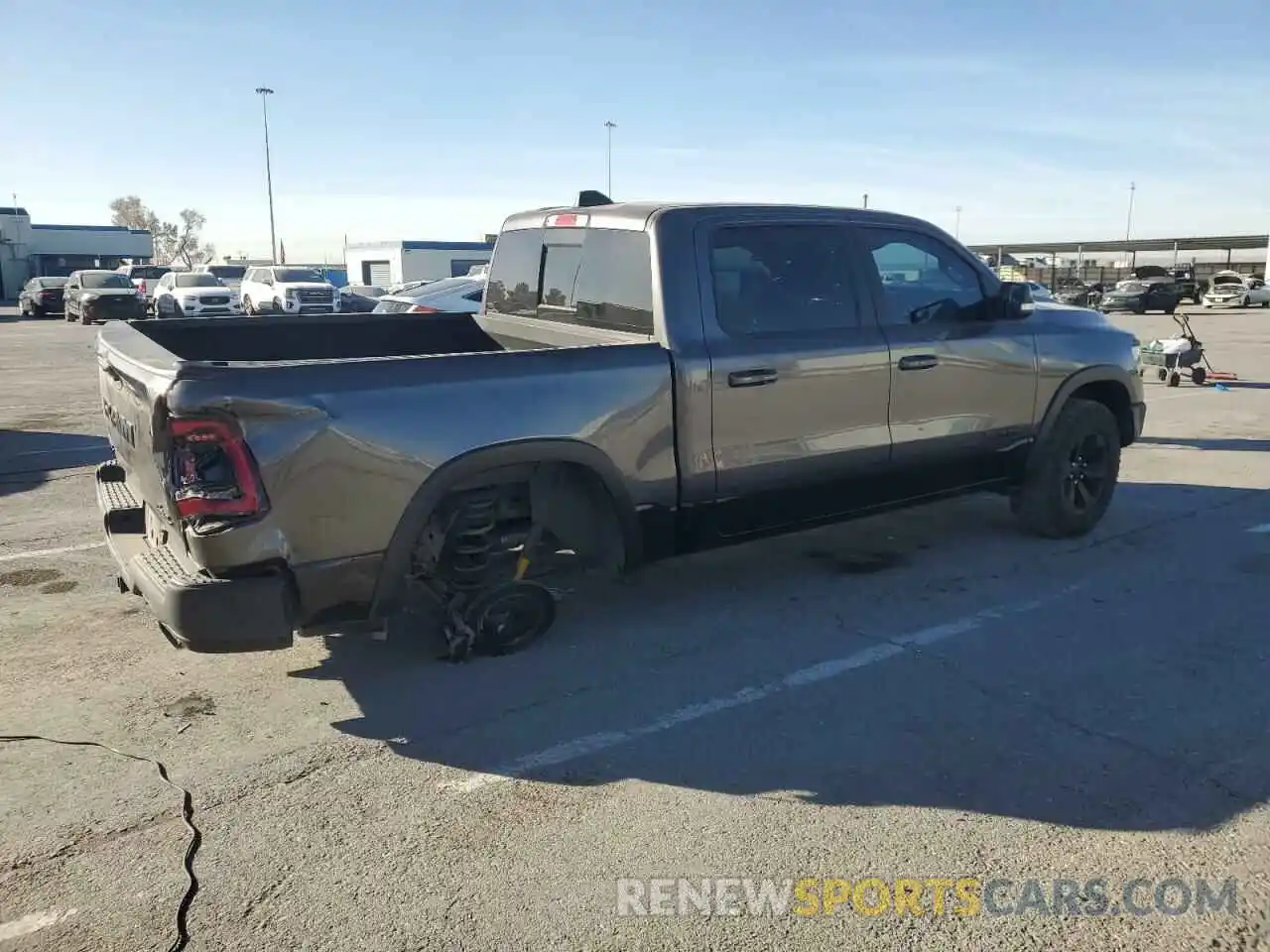 3 Photograph of a damaged car 1C6SRFLT4MN563379 RAM 1500 2021