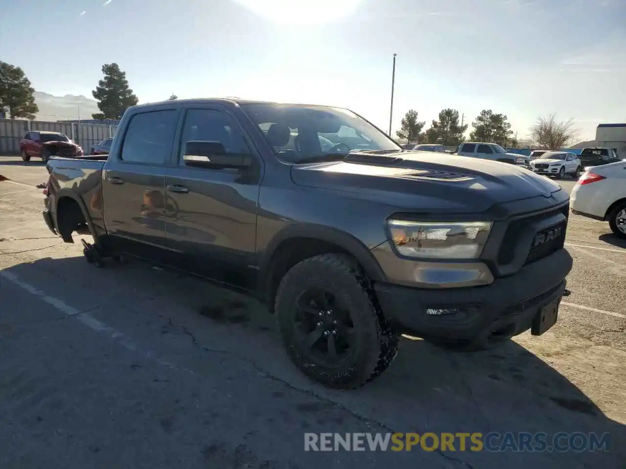 4 Photograph of a damaged car 1C6SRFLT4MN563379 RAM 1500 2021