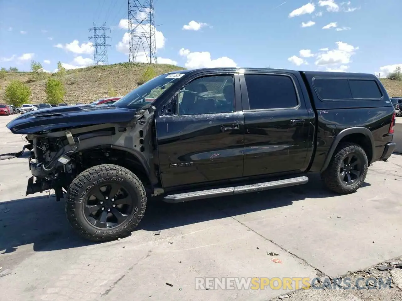 1 Photograph of a damaged car 1C6SRFLT5MN621886 RAM 1500 2021