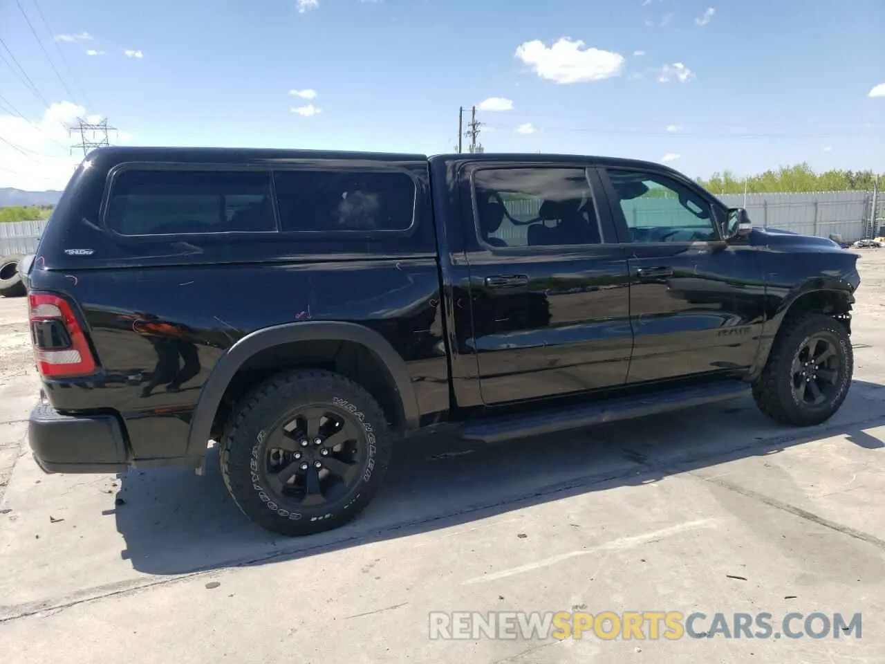 3 Photograph of a damaged car 1C6SRFLT5MN621886 RAM 1500 2021