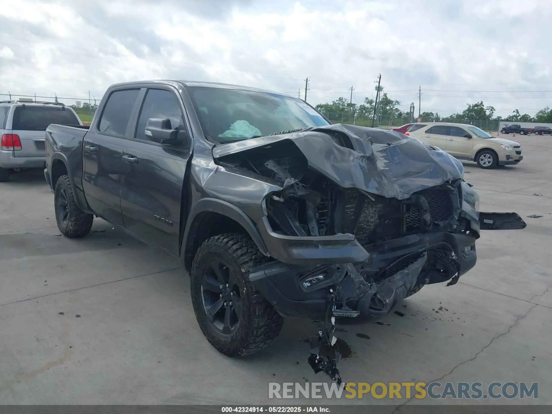 1 Photograph of a damaged car 1C6SRFLT7MN537312 RAM 1500 2021