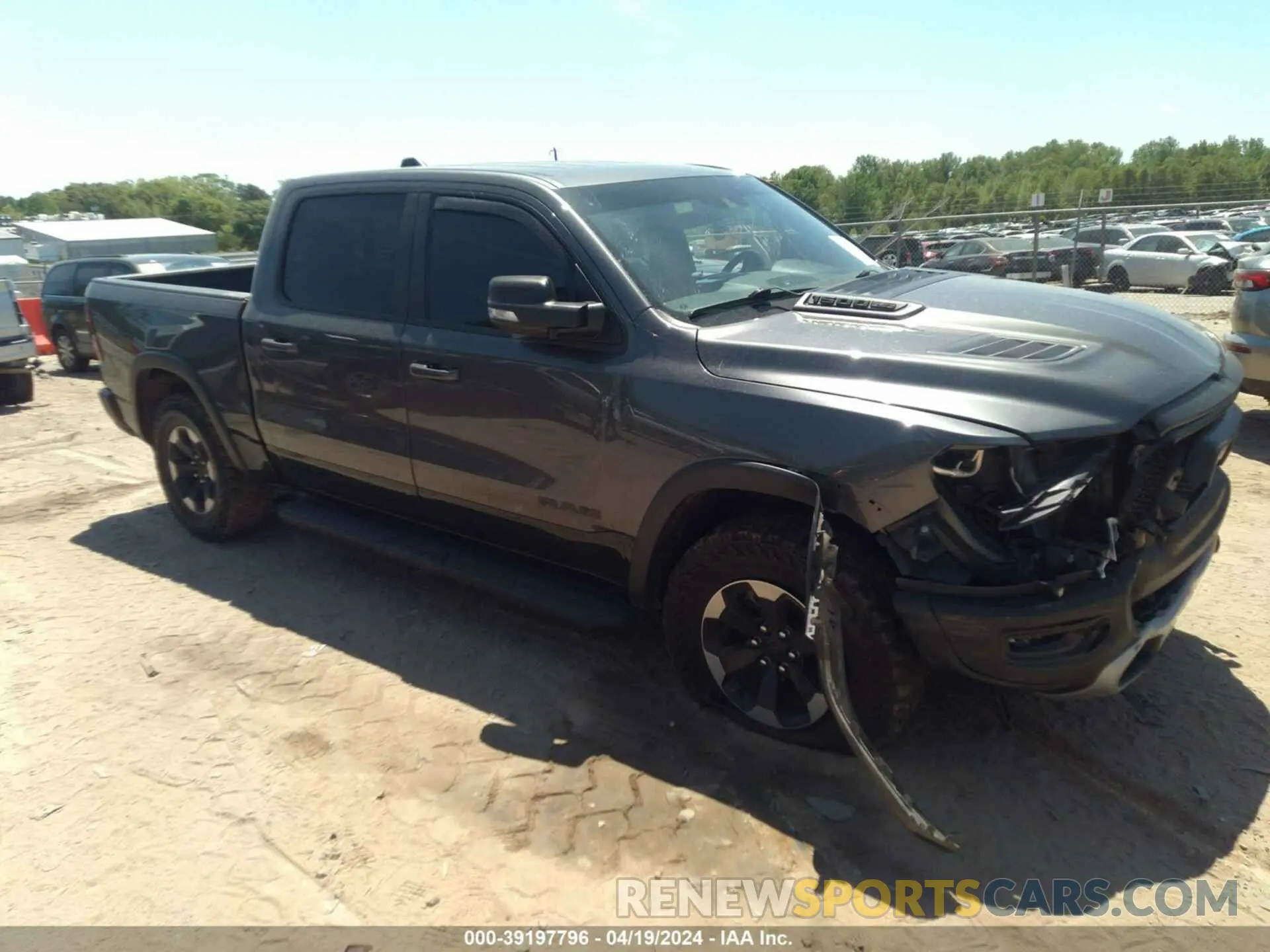 1 Photograph of a damaged car 1C6SRFLT8MN516985 RAM 1500 2021