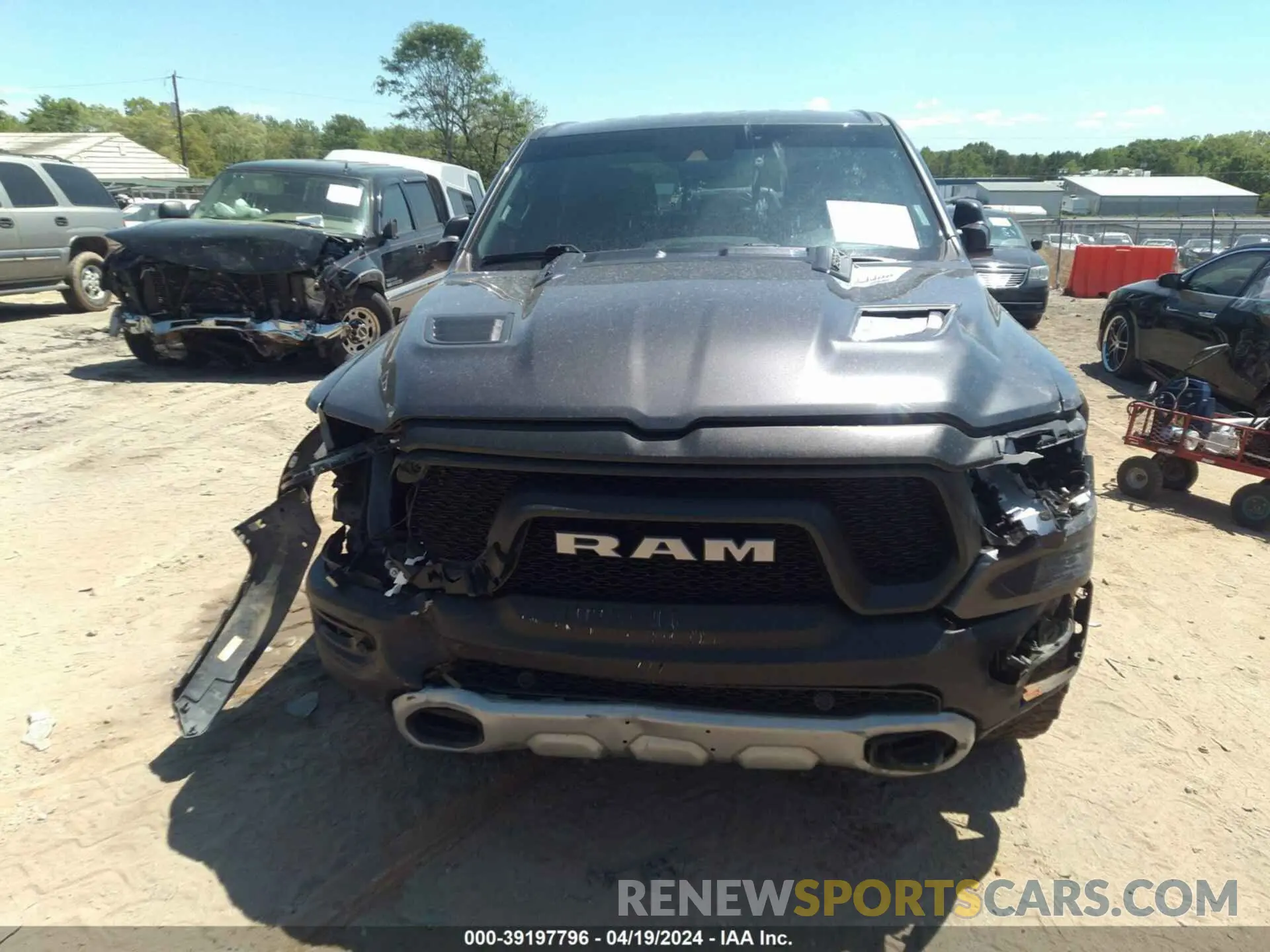 12 Photograph of a damaged car 1C6SRFLT8MN516985 RAM 1500 2021