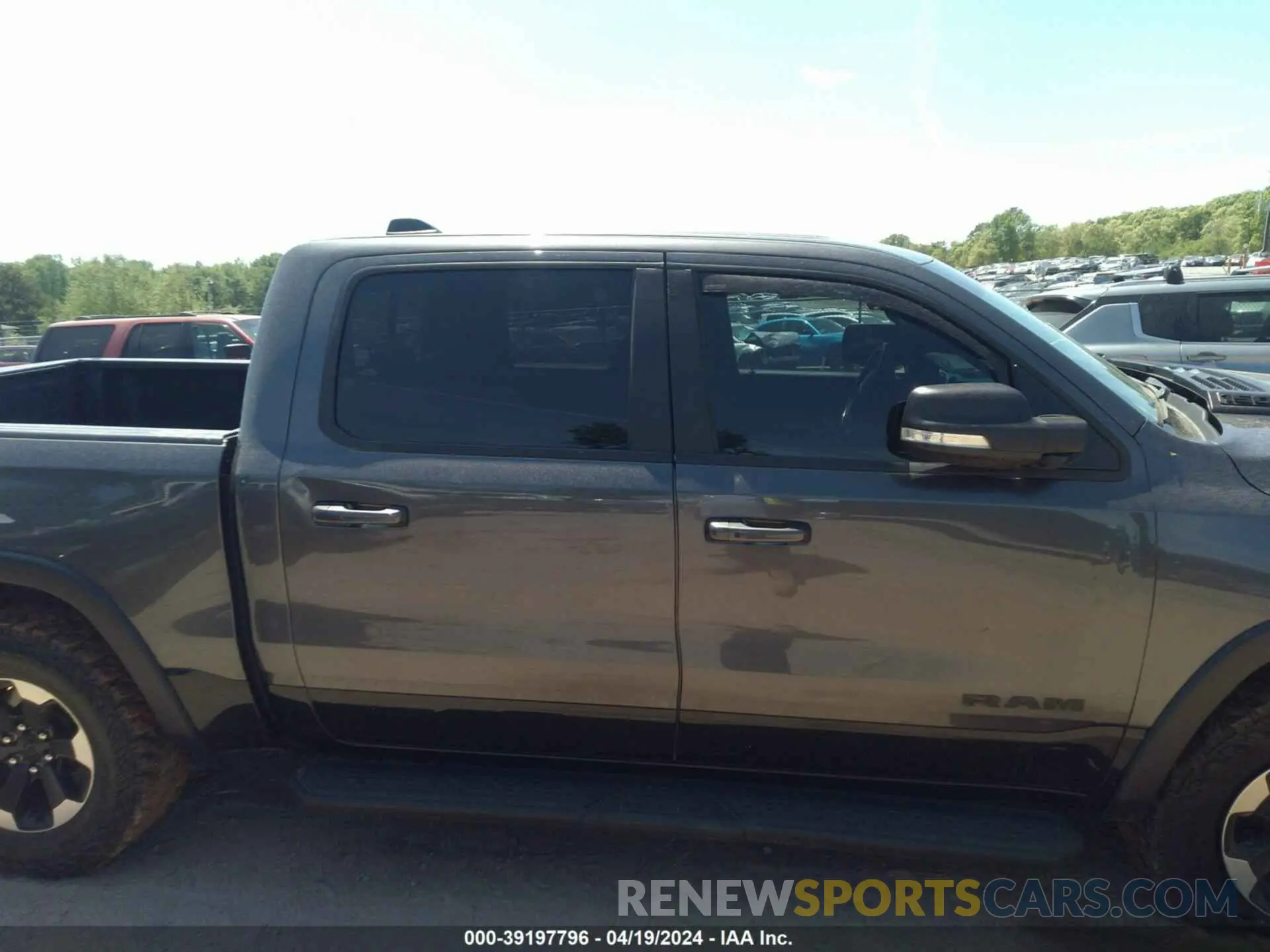 13 Photograph of a damaged car 1C6SRFLT8MN516985 RAM 1500 2021