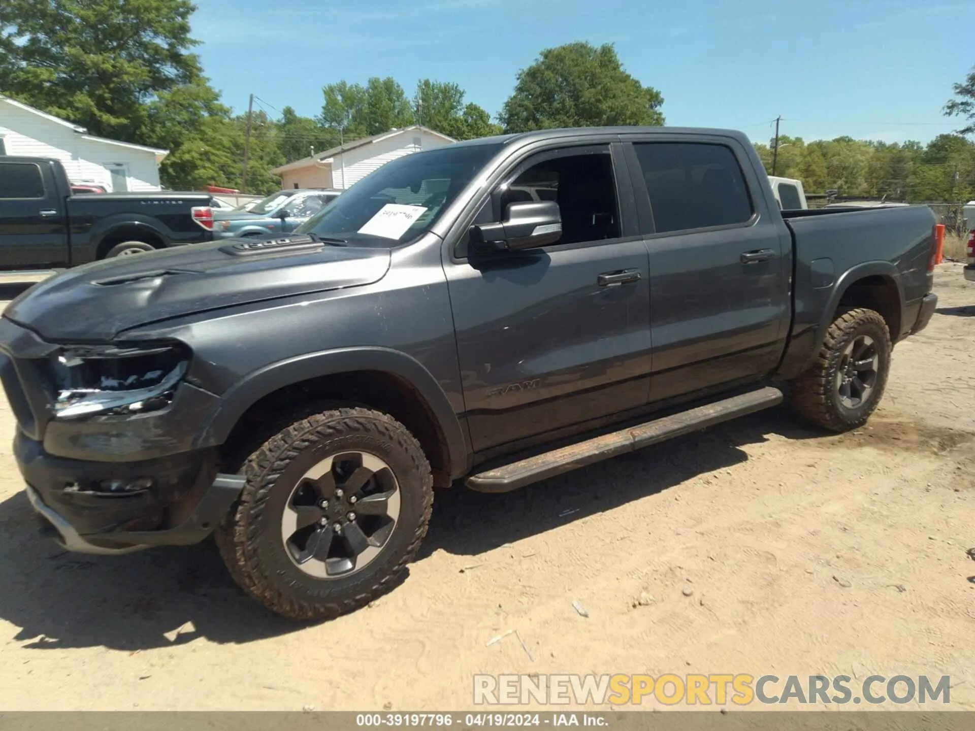 2 Photograph of a damaged car 1C6SRFLT8MN516985 RAM 1500 2021