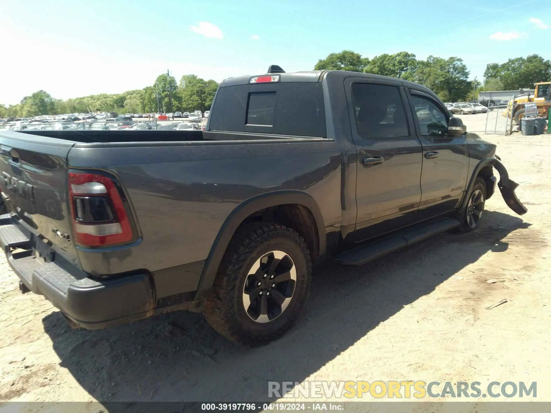 4 Photograph of a damaged car 1C6SRFLT8MN516985 RAM 1500 2021