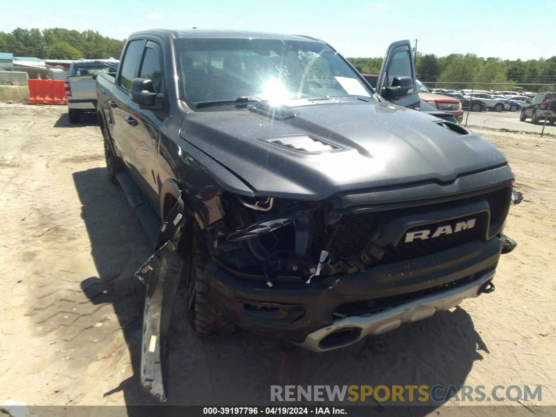 6 Photograph of a damaged car 1C6SRFLT8MN516985 RAM 1500 2021