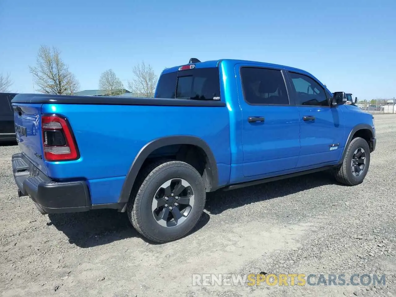 3 Photograph of a damaged car 1C6SRFLT8MN598457 RAM 1500 2021