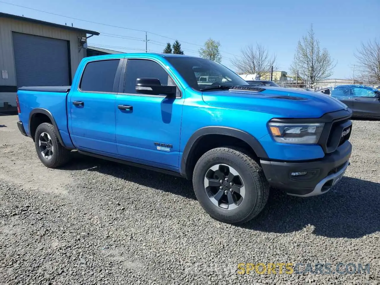 4 Photograph of a damaged car 1C6SRFLT8MN598457 RAM 1500 2021