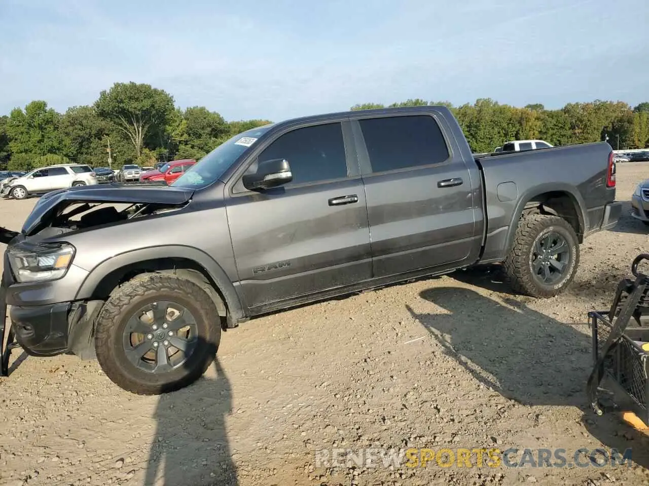 1 Photograph of a damaged car 1C6SRFLT8MN602703 RAM 1500 2021