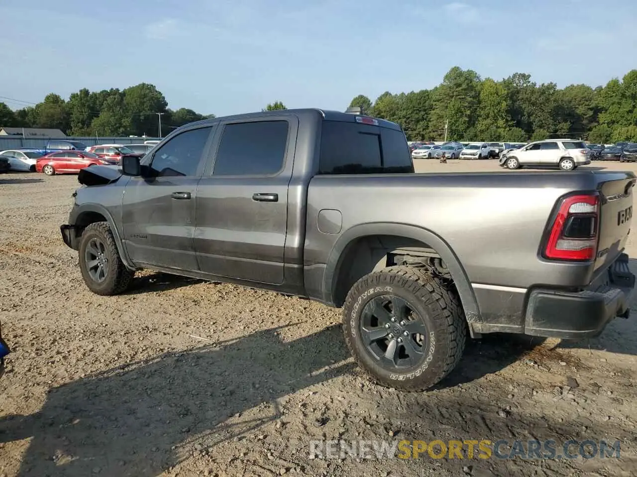 2 Photograph of a damaged car 1C6SRFLT8MN602703 RAM 1500 2021