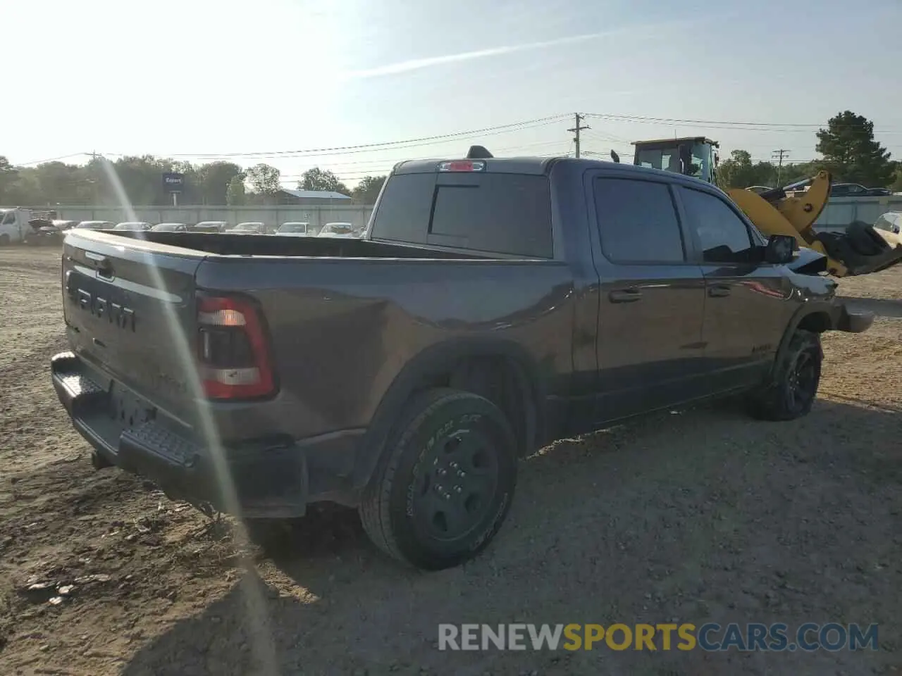 3 Photograph of a damaged car 1C6SRFLT8MN602703 RAM 1500 2021