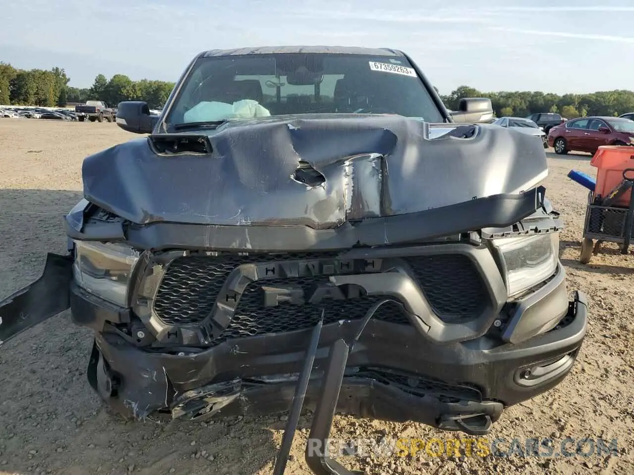 5 Photograph of a damaged car 1C6SRFLT8MN602703 RAM 1500 2021