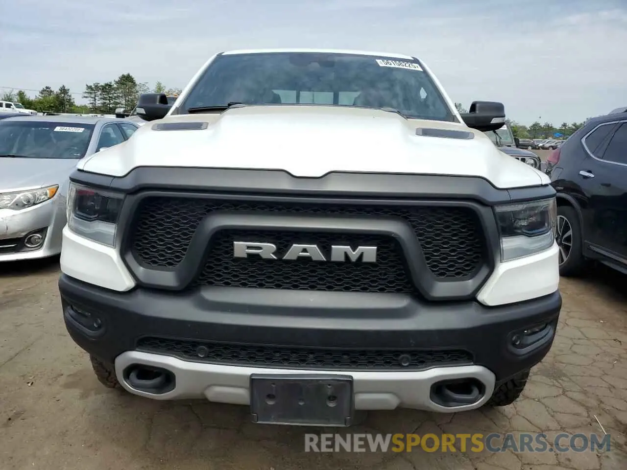 5 Photograph of a damaged car 1C6SRFLT9MN518387 RAM 1500 2021