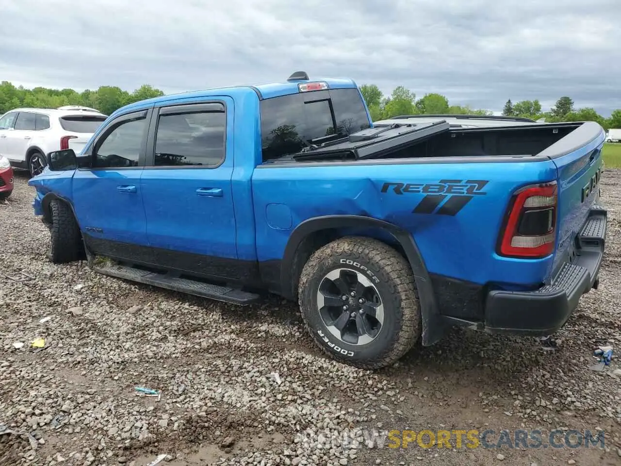 2 Photograph of a damaged car 1C6SRFLT9MN603035 RAM 1500 2021