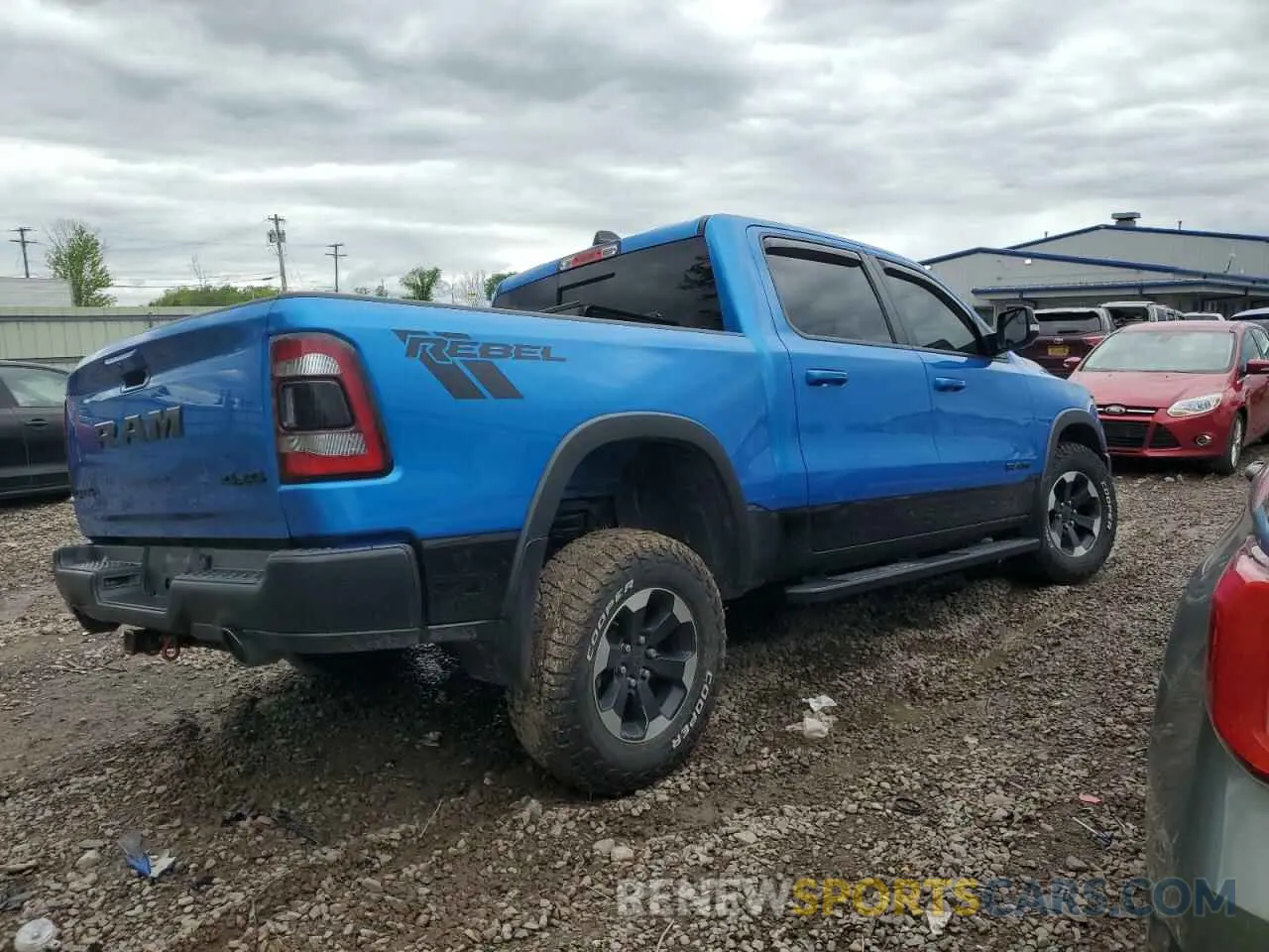 3 Photograph of a damaged car 1C6SRFLT9MN603035 RAM 1500 2021
