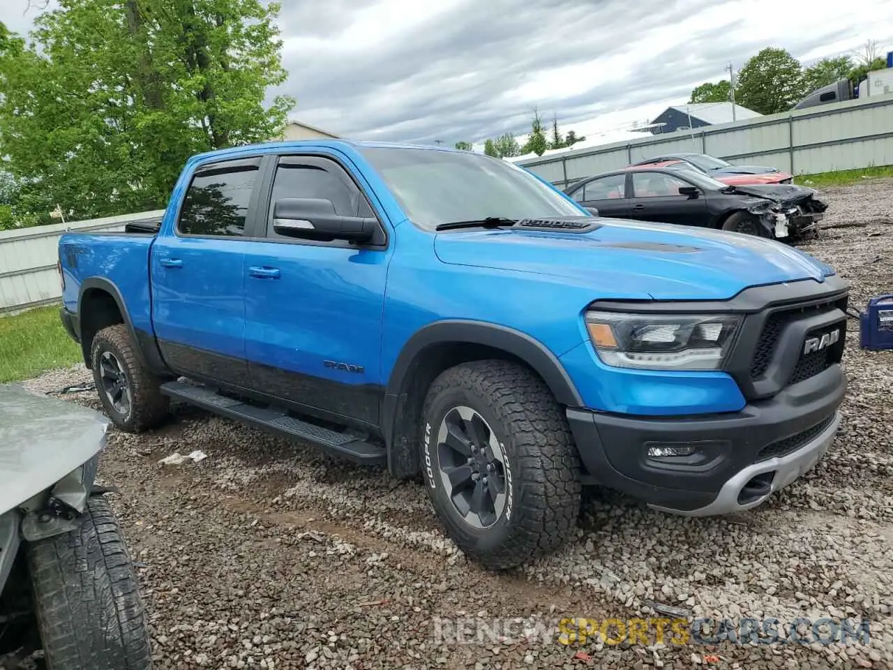 4 Photograph of a damaged car 1C6SRFLT9MN603035 RAM 1500 2021