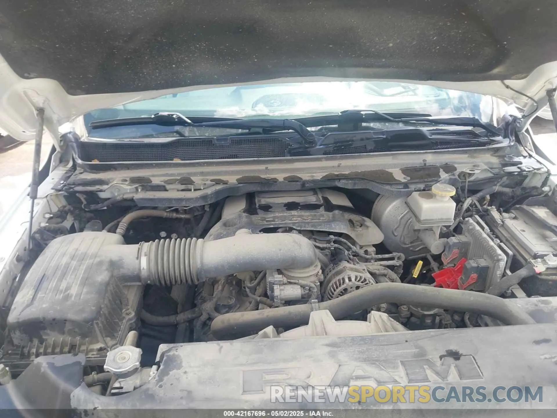 10 Photograph of a damaged car 1C6SRFLTXMN570577 RAM 1500 2021