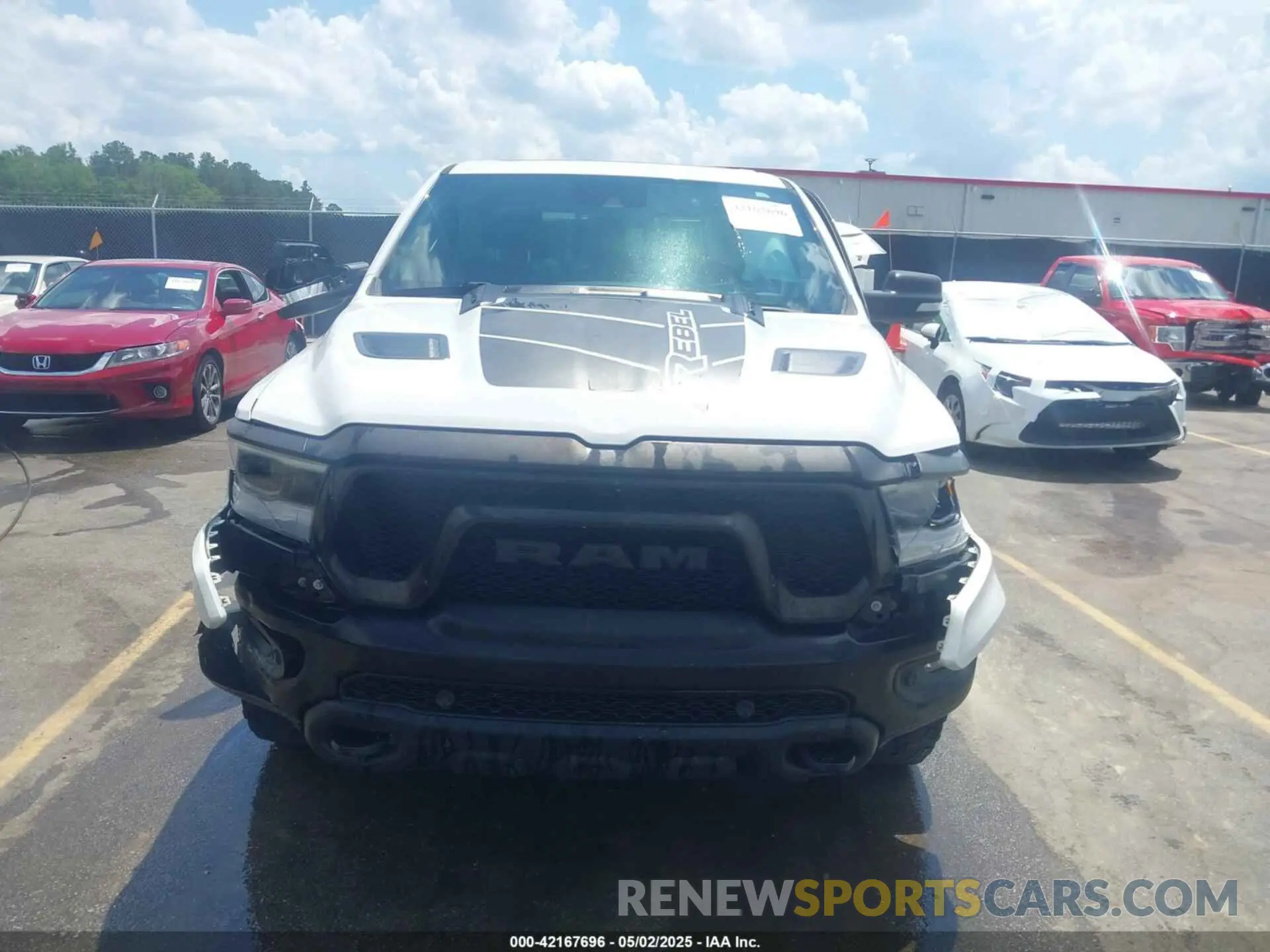 12 Photograph of a damaged car 1C6SRFLTXMN570577 RAM 1500 2021
