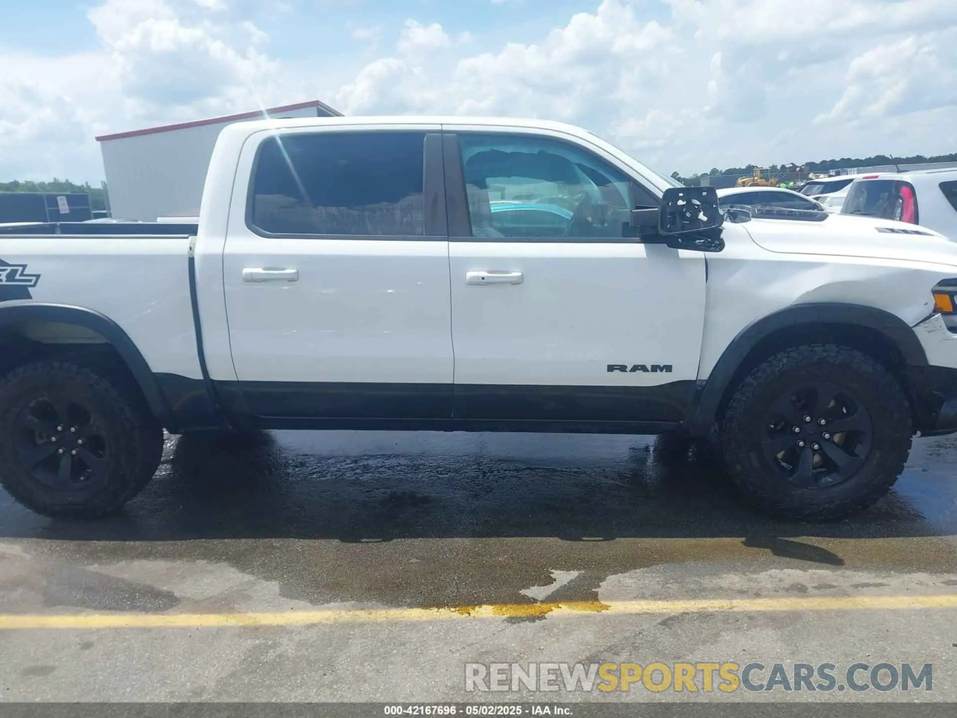 13 Photograph of a damaged car 1C6SRFLTXMN570577 RAM 1500 2021