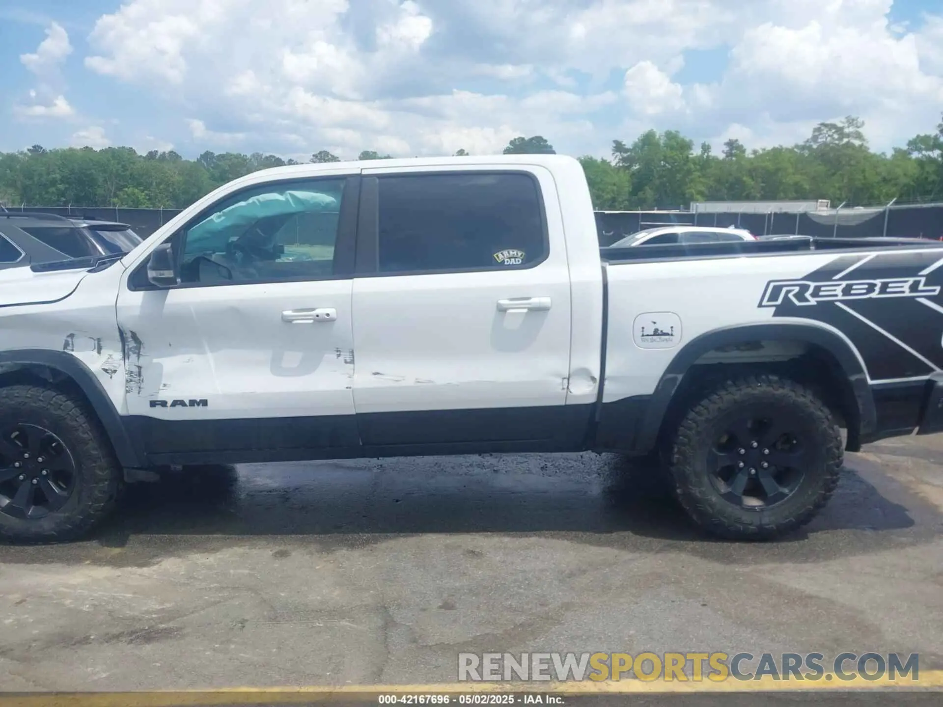 14 Photograph of a damaged car 1C6SRFLTXMN570577 RAM 1500 2021