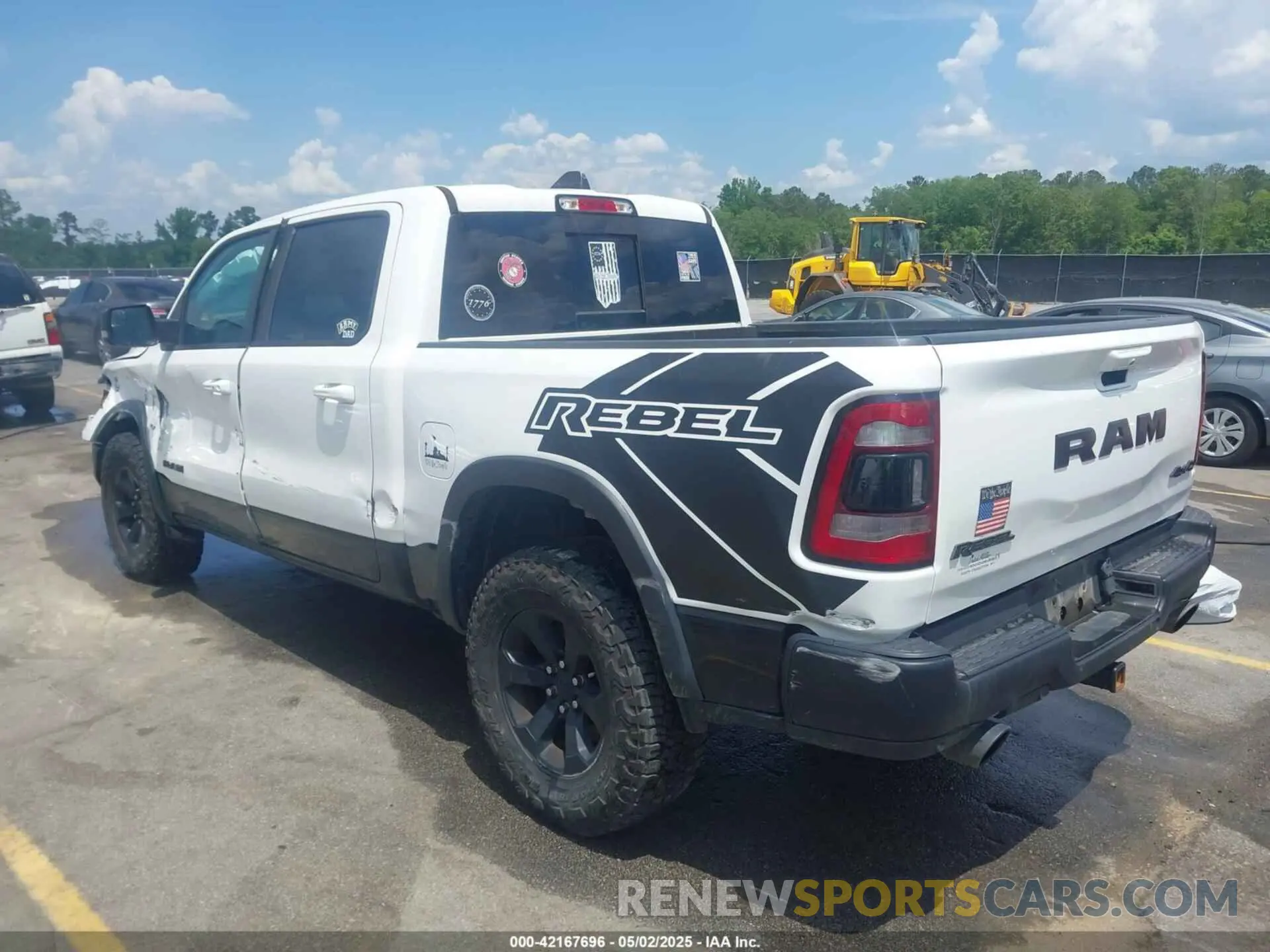3 Photograph of a damaged car 1C6SRFLTXMN570577 RAM 1500 2021