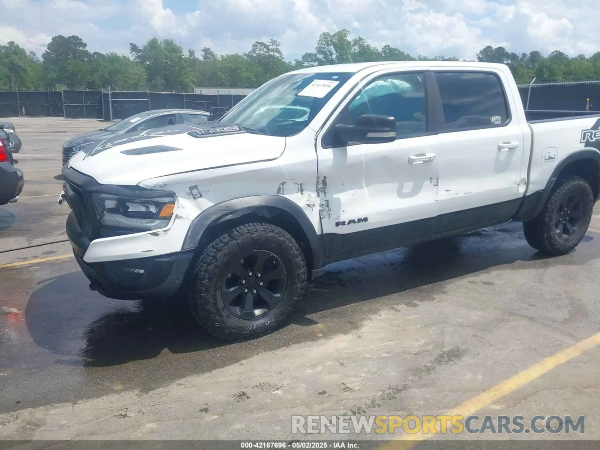 6 Photograph of a damaged car 1C6SRFLTXMN570577 RAM 1500 2021