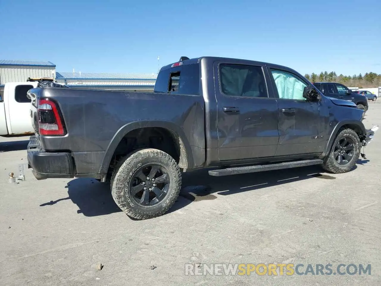 3 Photograph of a damaged car 1C6SRFLTXMN646198 RAM 1500 2021