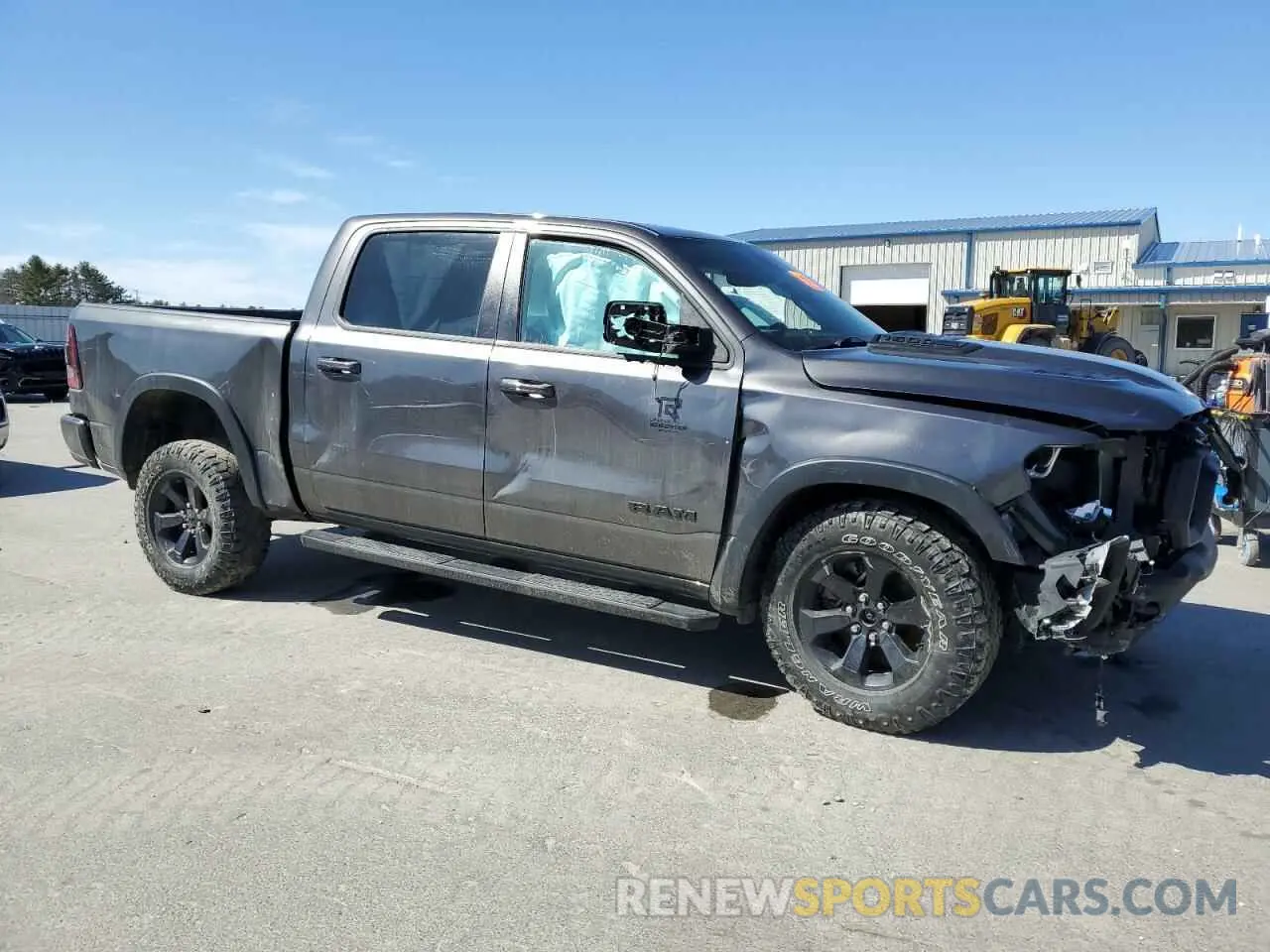 4 Photograph of a damaged car 1C6SRFLTXMN646198 RAM 1500 2021