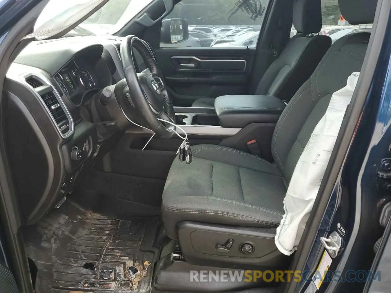 7 Photograph of a damaged car 1C6SRFMT0MN725619 RAM 1500 2021